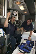 Photo of EMS students inside an Ambulance