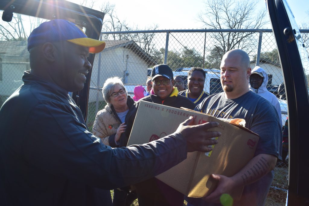 Albany State University faculty and staff members deliver 400 meals to Albany storm victims