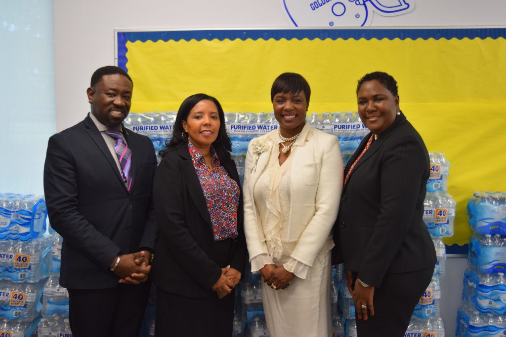 The Bahamas Consulate General, Atlanta staff donated 50 cases of water to ASU to assist with storm recovery. L to r: Robert M.O.S. Pinder, cultural & student relations attaché’; Cynthia Evers, ASU vice president of Student Affairs and Success; Monique D. Vanderpool, deputy consul general; and Katherine Kikivarakis, ASU director of Internal Audit.