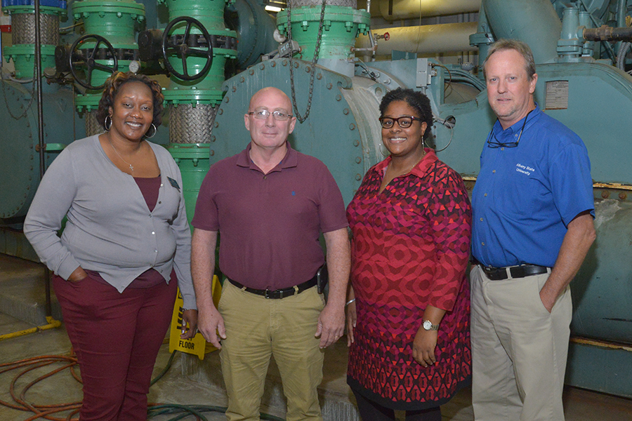 The ASU facilities department leads energy conservation efforts for the institution. L to R Patrina Anderson, assistant director of facilities management; Anthony Espy, mechanical trades manager; Calandra Haywood, work/quality control coordinator; and Lee Howell, director of facilities management. Photo credit: Reginald Christian