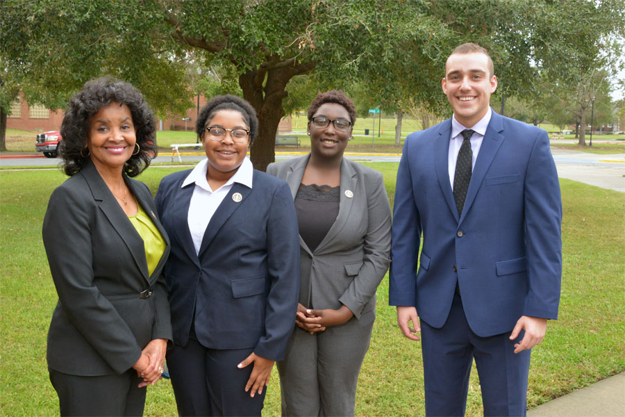 Three Albany State University students presented research in Berlin to commemorate the legacy of scholar and activist W.E.B DuBois. L to R: Florence Lyons, director of the Velma Fudge Grant Honors Program, Kristin Martin, Sabrina Netters and Levi Koebel. Three ASU presented in Berlin