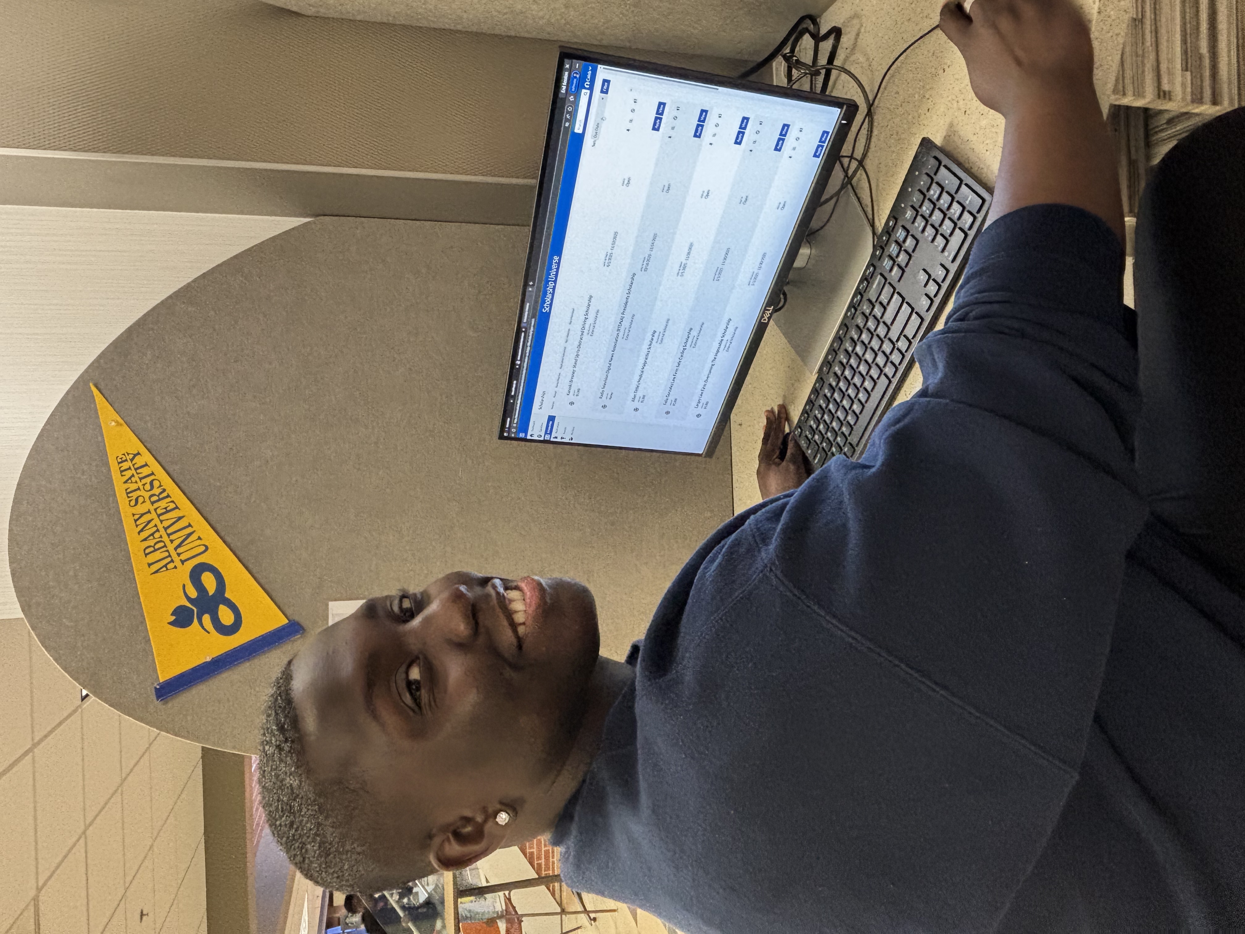 Student using scholarship tool Student using scholarship tool