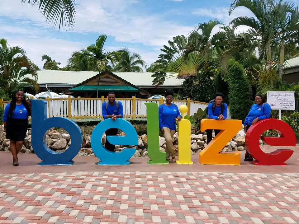 Group with Belize Sign