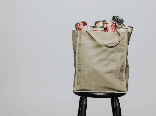 Bag of Groceries sitting on a stool